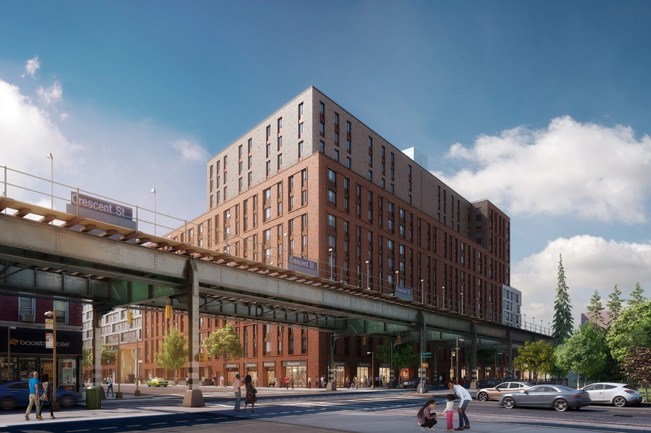 View of Crescent St station with Atlantic Chestnut affordable housing development behind.