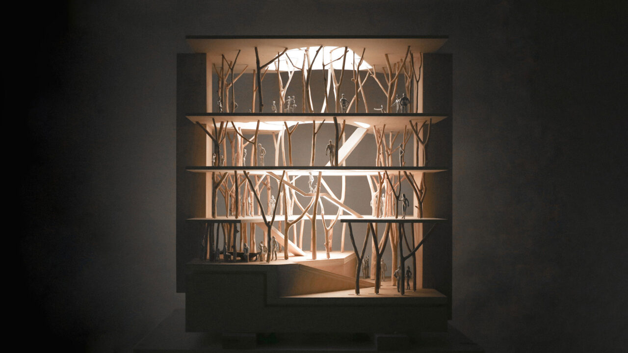 An illuminated view of a multistory mass timber building model with branching tree columns. Photo: KVA Matx.
