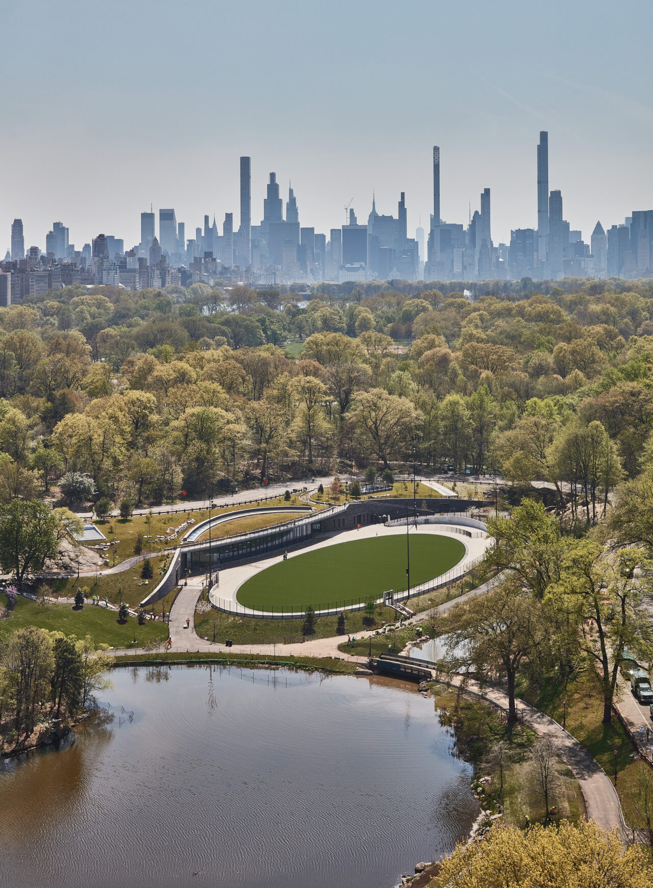 An elliptical swimming pool transformed into a new public green