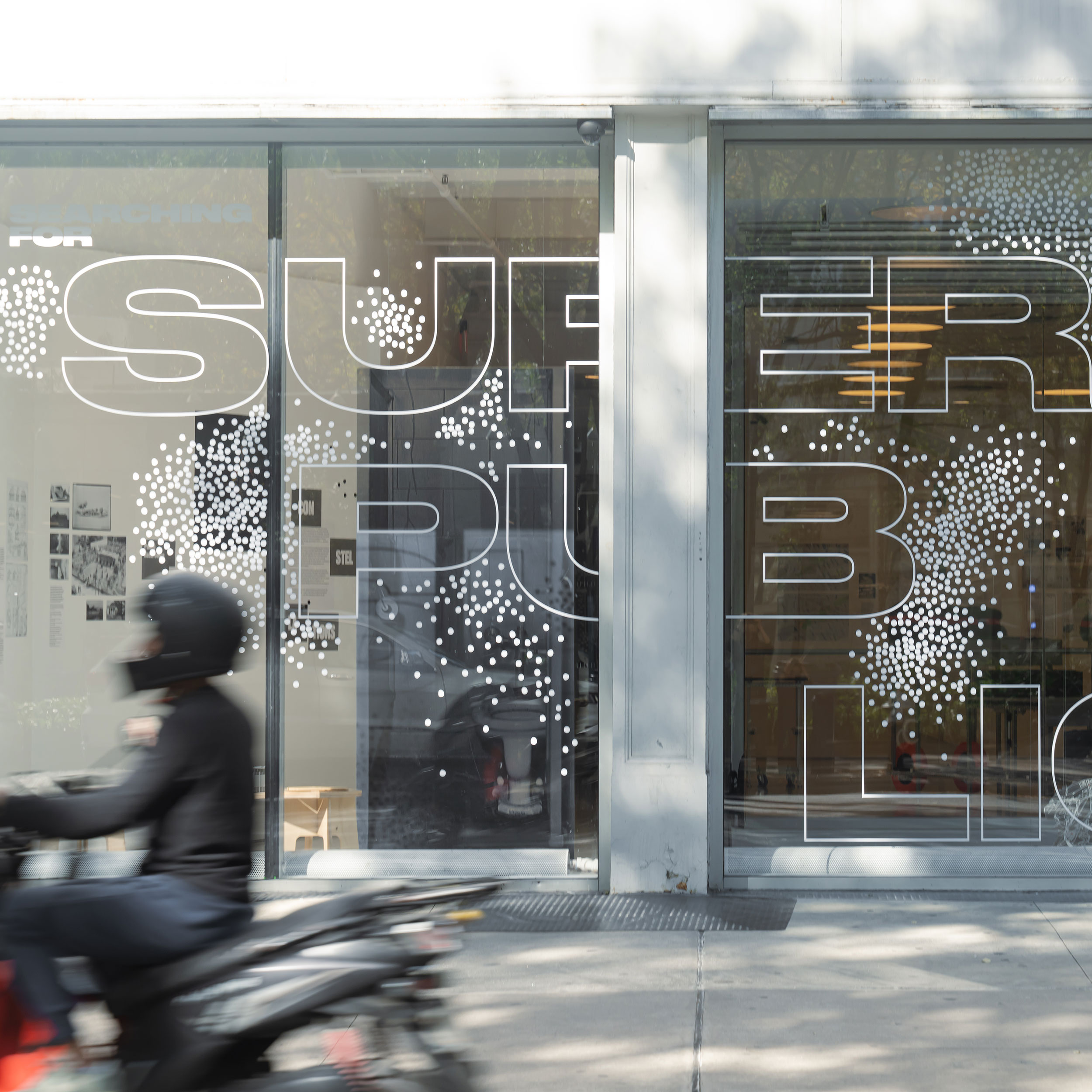 Searching for Superpublics installation view of the exterior facade with exhibition signage
