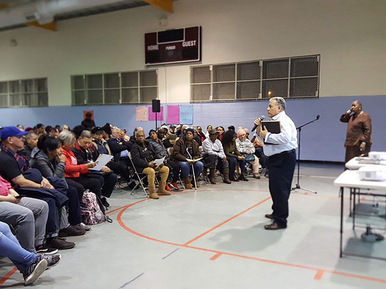 The architect's photograph of an information session for tenants of a Brooklyn NYC Housing Authority campus entering into a housing affordability program (PACT-RAD), which includedproposed architect-led rehabilitation efforts. Photo: Courtesy RKTB.