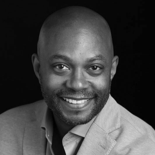 Headshot in black and white of Gregory Switzer