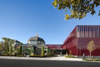 ARO’s 17,000-square-foot, L-shaped education and visitor center nestles around the restored historic Victorian greenhouse.