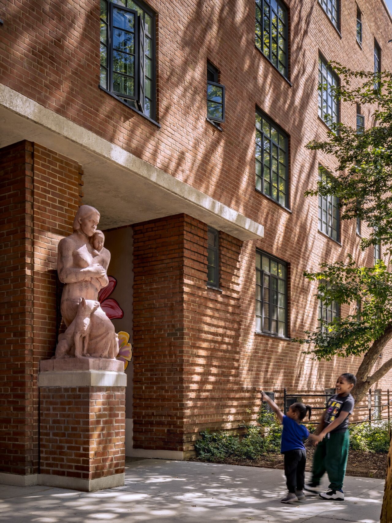 Jablonski Building Conservation helped restore of some sculptures at the Harlem River Houses, including the 1939 cast-concrete piece “Mother and Child with Dog.”