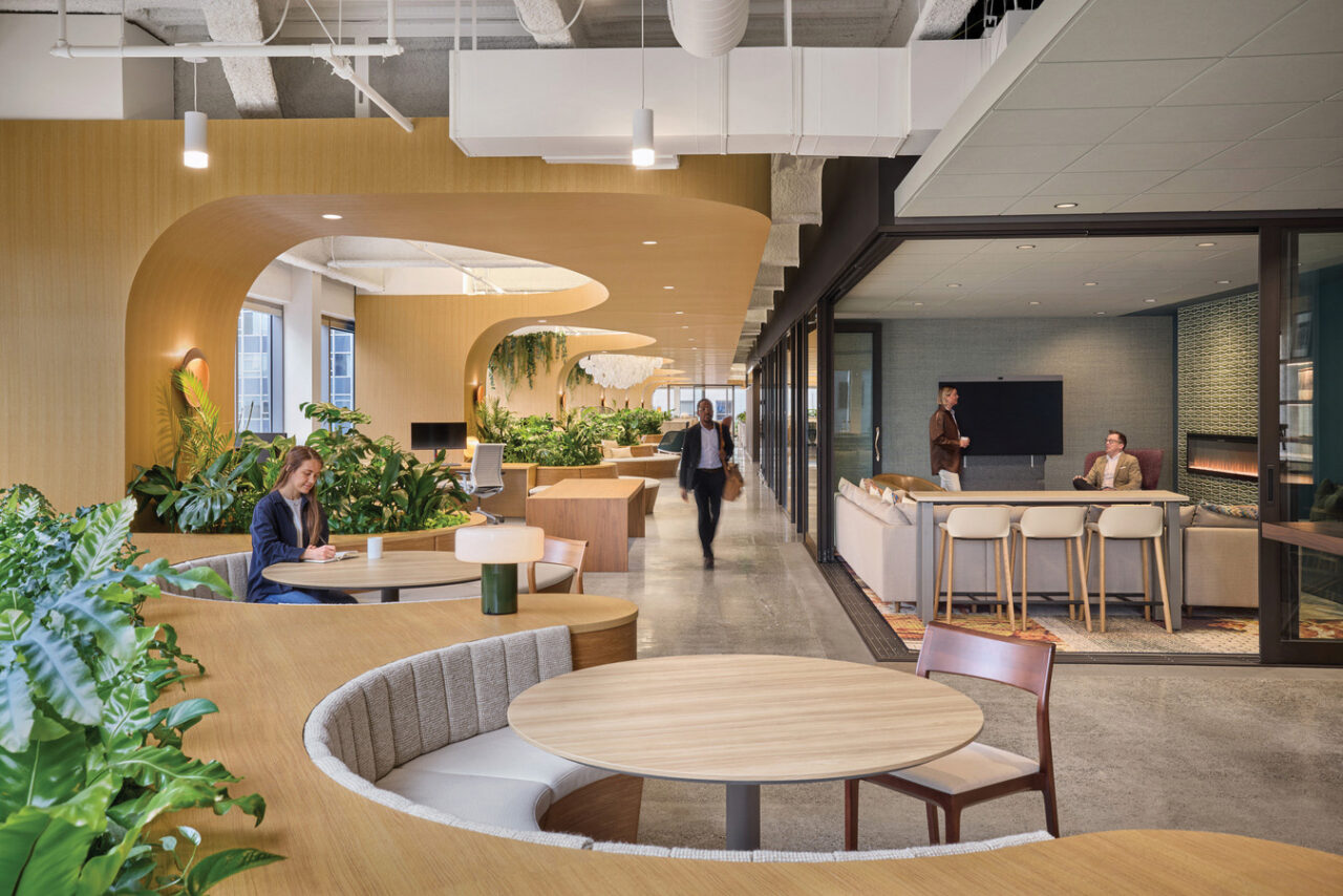 A curving seating and ceiling area inside an office