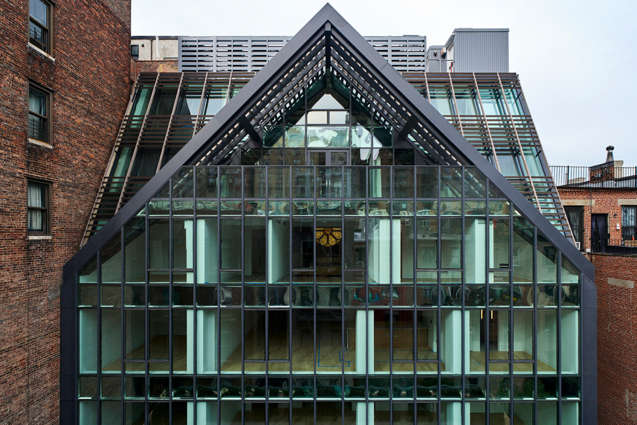Exterior facade of a building's glass gable
