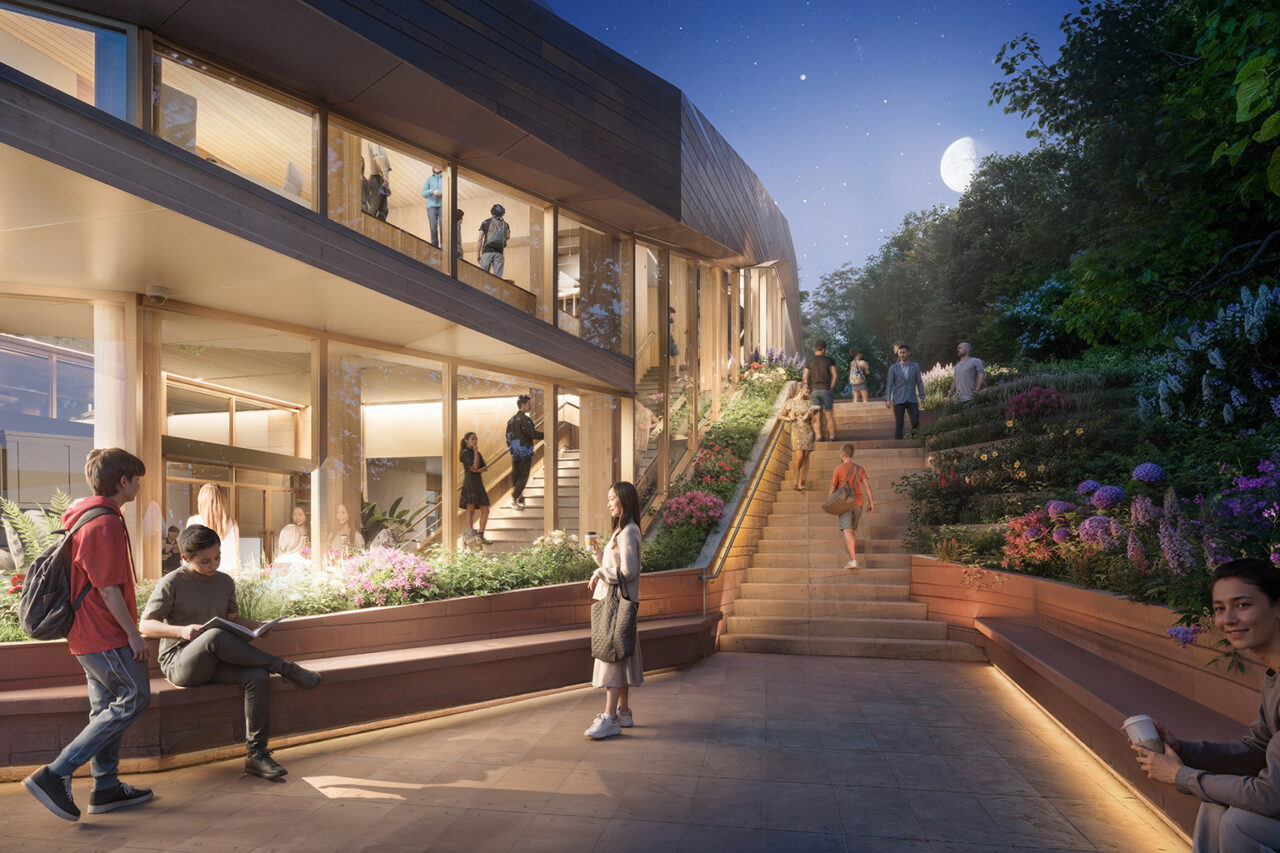 Rendering of a landscaped pathway leading up stairs beside a building depicted in evening light with the building interior at left illuminated in warmer light