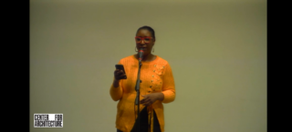 Image of Talisha L. Sainvil AIA, NOMA, LEED telling her story to Architecture