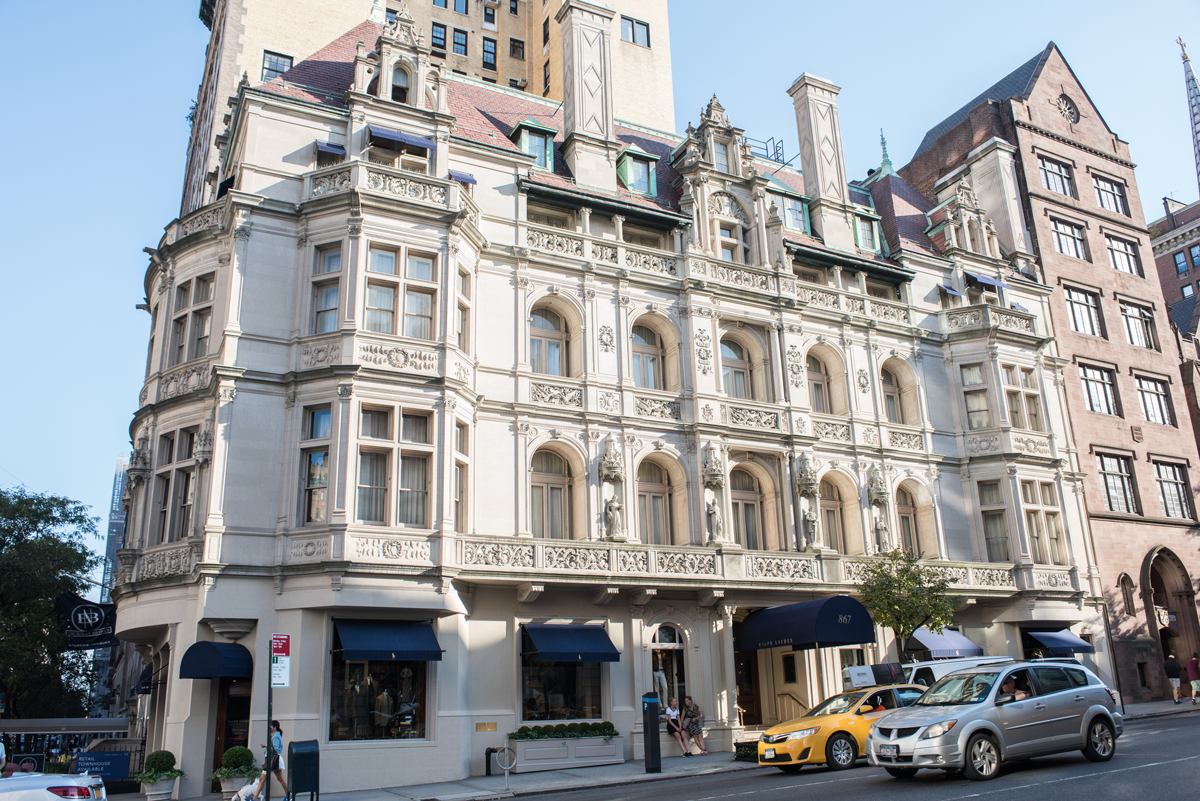 A photograph of the exterior facade of a historic building along Madison Avenue in New York City