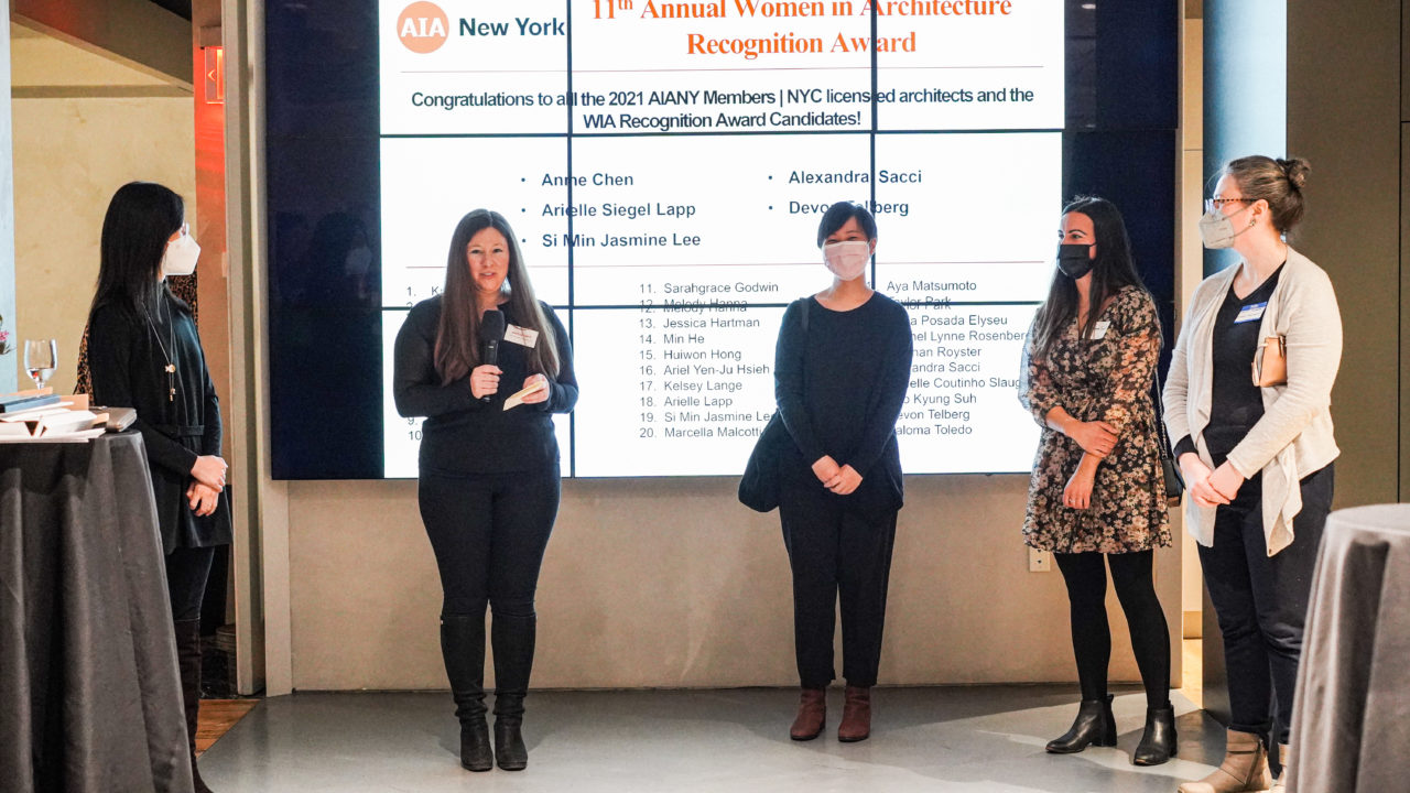 Candid event photo from Women in Architecture Recognition Award and Holiday Party