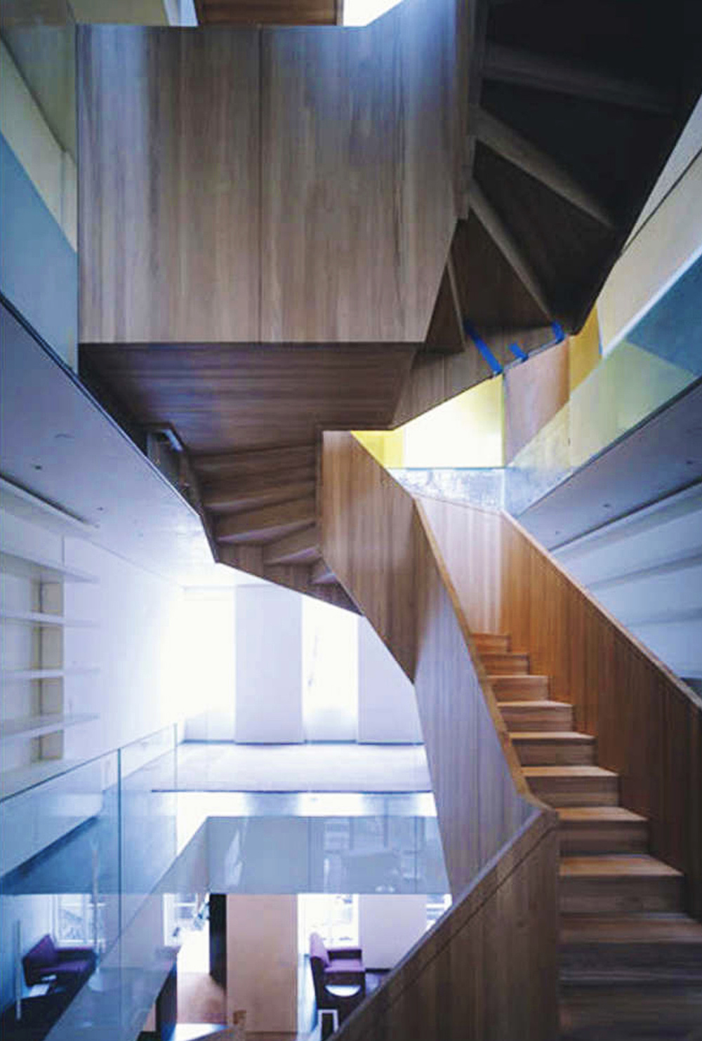 View of the central stair from a mid-level during construction. Photo: Natalie Chen.