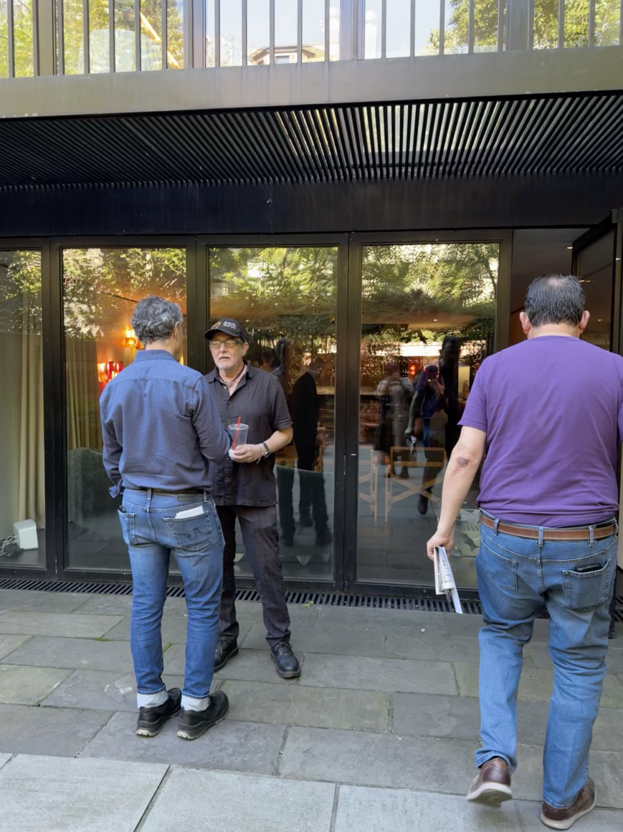 Stephen Moser, AIA, Co-Chair of AIANY CORA, speaks with Jason Gold of Richard Lewis Architect on the rear terrace. Photo: Natalie Chen.